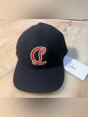Christian Louboutin Mooncrest Ivy AC
Baseball cap - Canva - large
